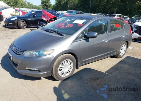 2010 Honda Insight Lx z USA, uszkodzony, nr VIN JHMZE2H51AS014899
